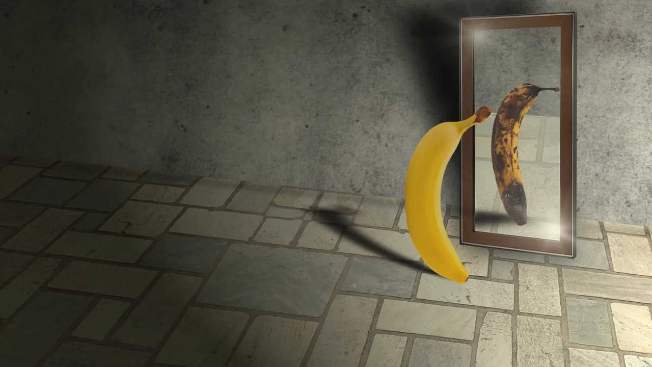 Low self-esteem - A banana reflected in mirror and see an inferior version of itself
