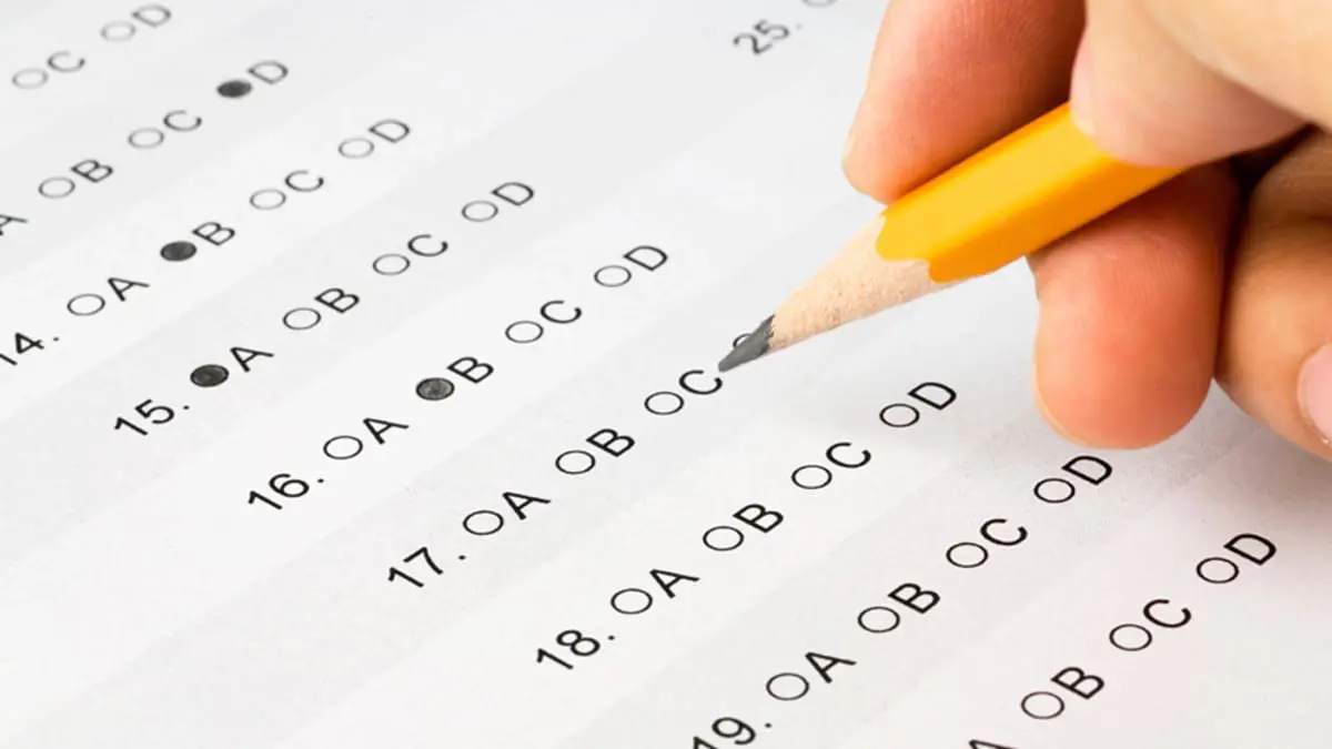 Someone completing a multi-choice exam - online depression test